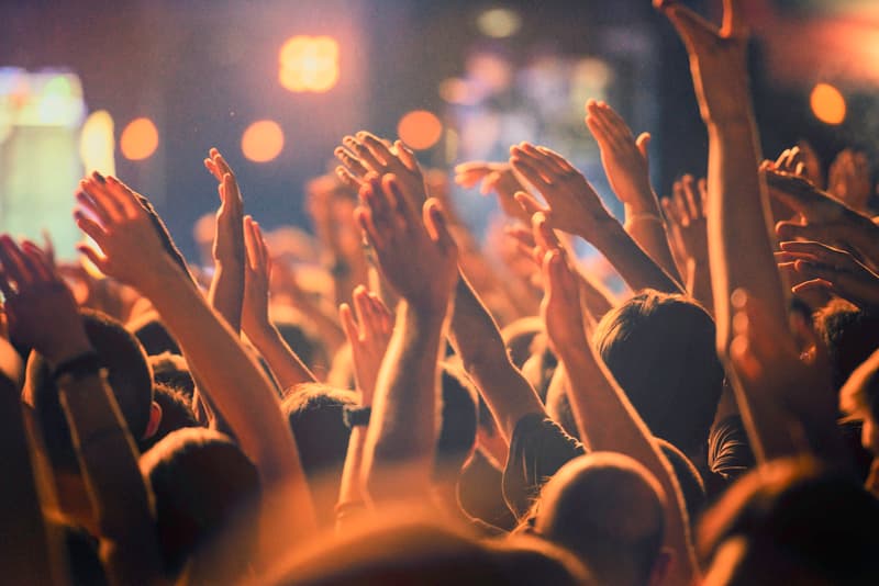 Raised hands at a concert