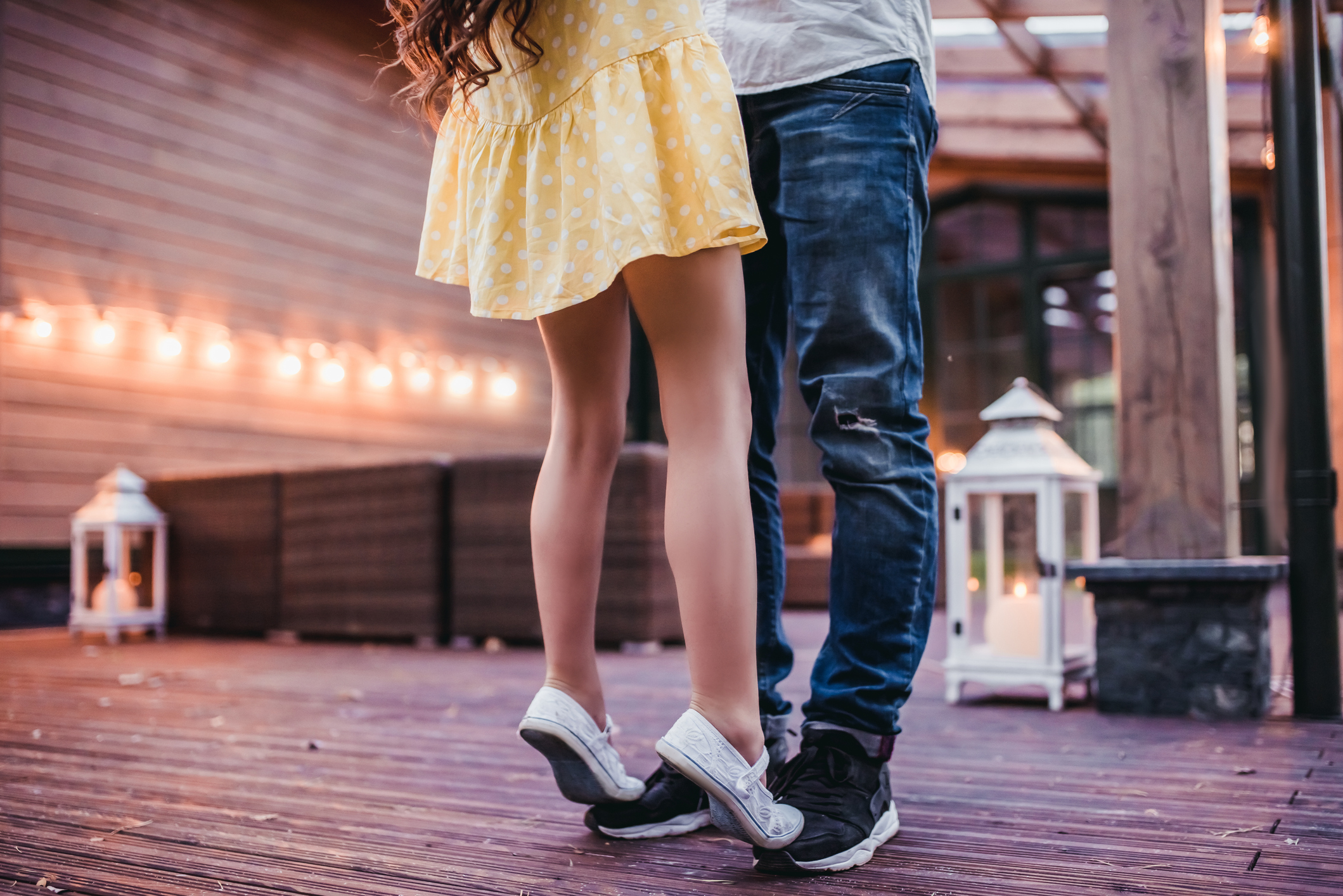 Dad dancing with daughter