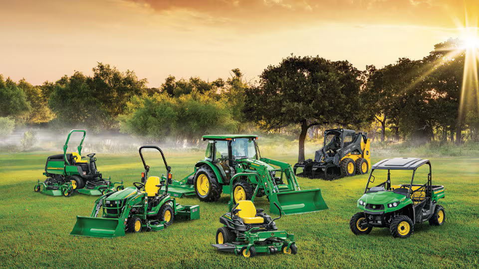 John Deere machinery in field